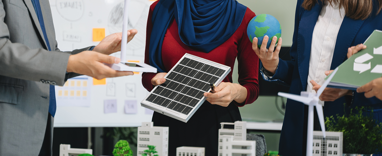 Team discussing renewable energy and sustainability solutions