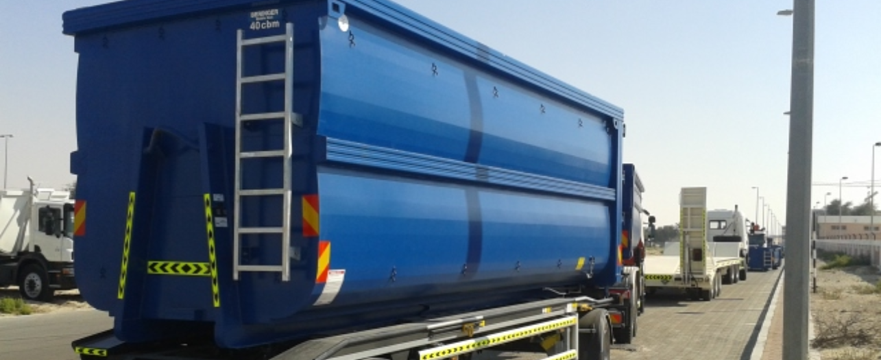 Green outdoor recycling compactor bin Green outdoor recycling compactor bin