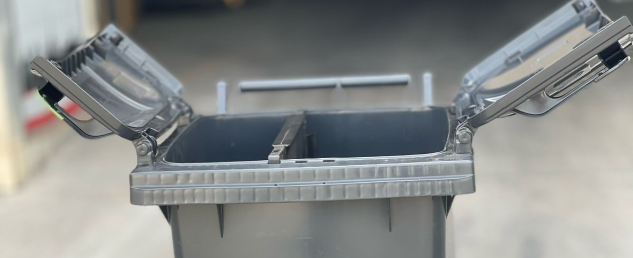 Green outdoor recycling compactor bin Green outdoor recycling compactor bin